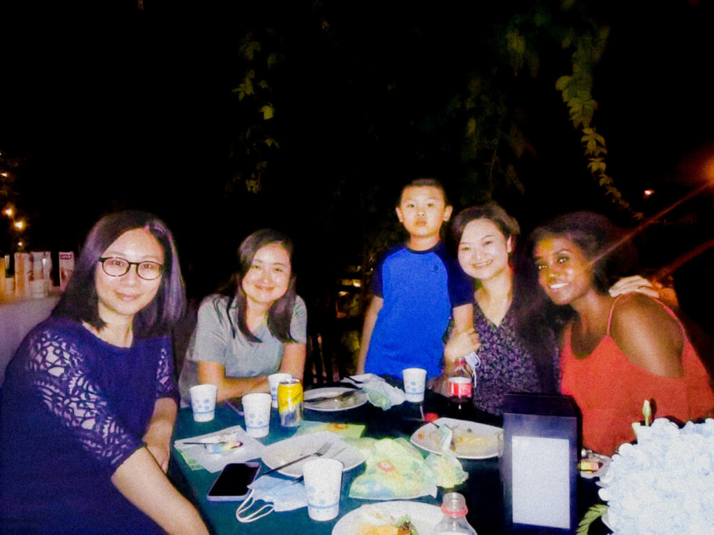 Group of people around a dining table