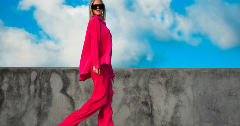 Woman in reddish loose suit
