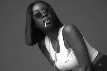 Black woman with a bob hair cut wig