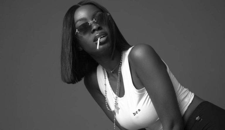 Black woman with a bob hair cut wig