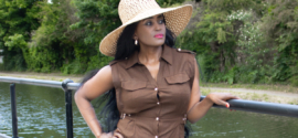 How to accessorise an outfit: An elegant woman in a wide-brim hat, showcasing a perfect accessory choice