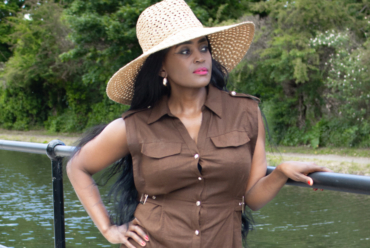 How to accessorise an outfit: An elegant woman in a wide-brim hat, showcasing a perfect accessory choice