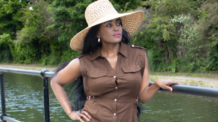 How to accessorise an outfit: An elegant woman in a wide-brim hat, showcasing a perfect accessory choice
