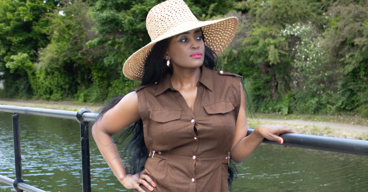 How to accessorise an outfit: An elegant woman in a wide-brim hat, showcasing a perfect accessory choice