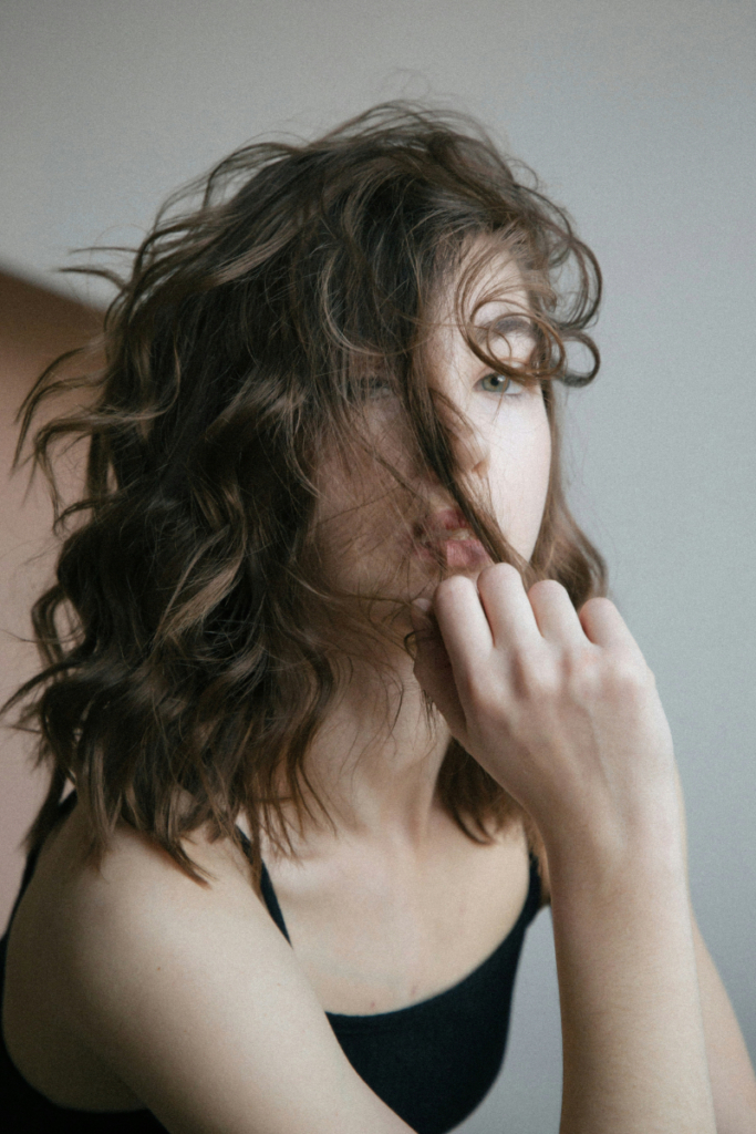 Brunette with shoulder length hair cut. One of the the perfect bob wig styles for summer to copy
