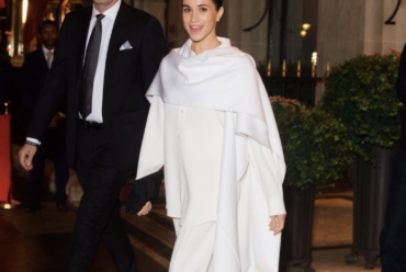 The duchess of Sussex, Meghan Markle in an all white ensemble making her debut at the 2025 Balenciaga Paris Fashion Week.