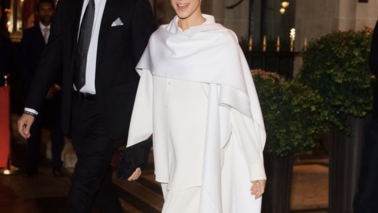 The duchess of Sussex, Meghan Markle in an all white ensemble making her debut at the 2025 Balenciaga Paris Fashion Week.