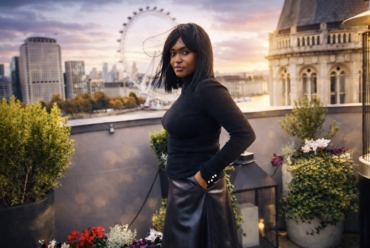 Word of the year growth — a reflective portrait of Nillah on a London rooftop at sunset, symbolising intention and personal growth.